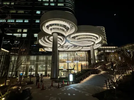 Exterior of Tower Plaza at night 