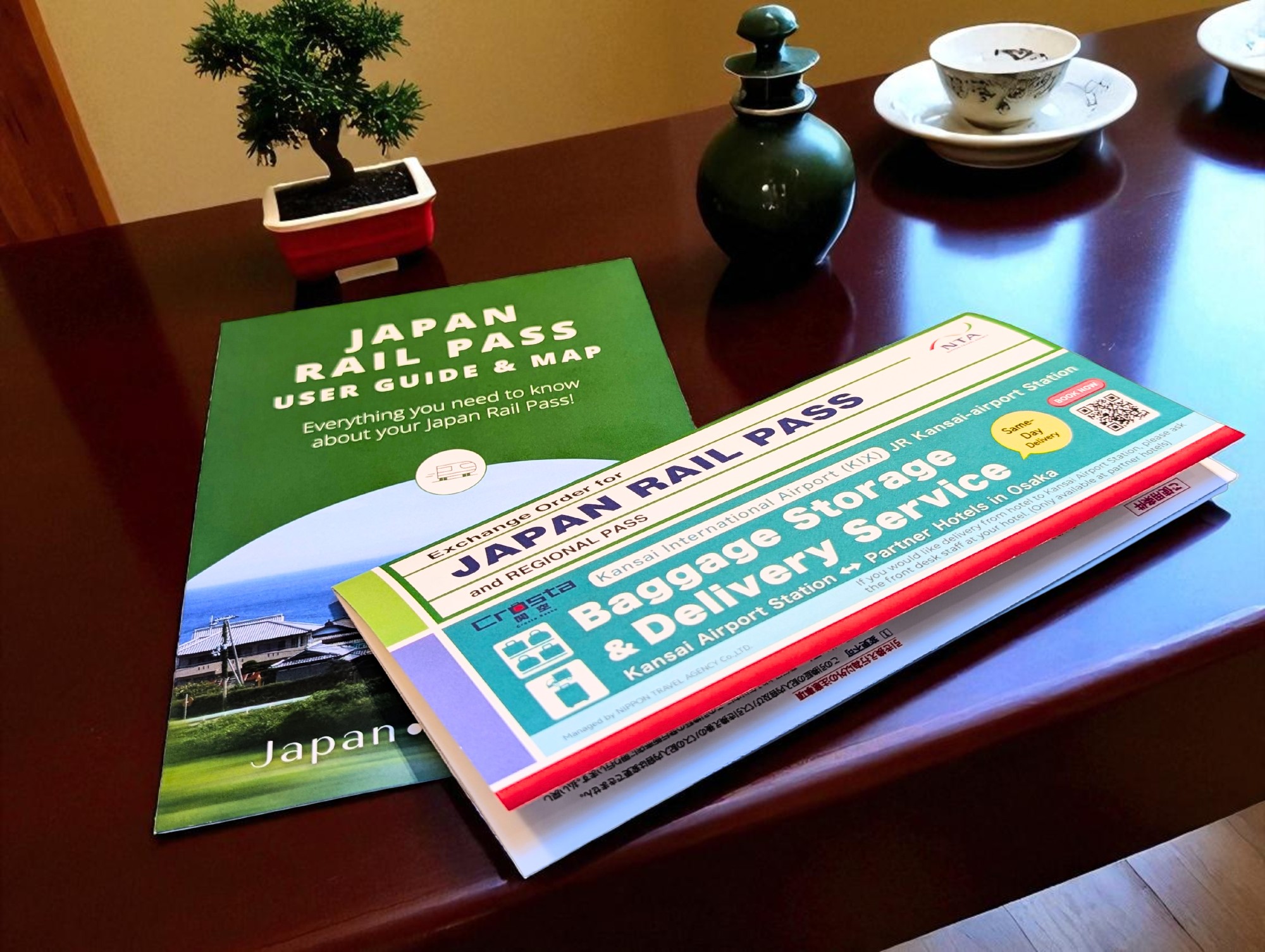 Voucher Japan Rail Pass on a table Voucher Japan Rail Pass on a table