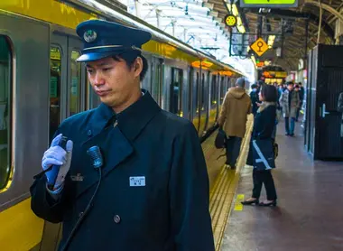 Station worker on the Chuo Sobu Line Station worker on the Chuo Sobu Line