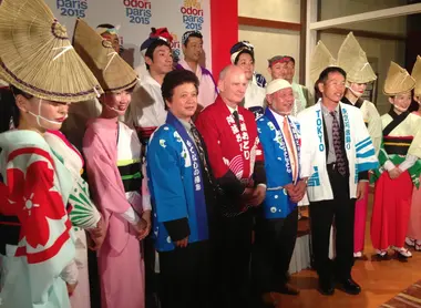 The mayor of the fourth arrondissement of Paris, Christophe Girard, surrounded by dancers Awa Odori at the Embassy of France in Japan.