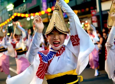 Awa Odori dancer of the festival (Tokushima), wearing the traditional hat amigasa.