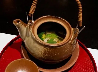 Broth Matsutake Dobin Mushi soup served in his foolscap.