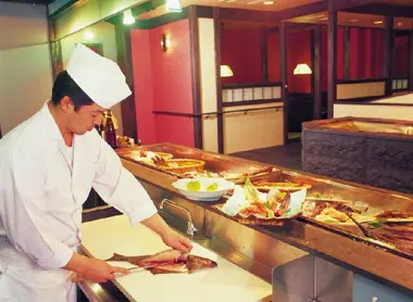 A chef preparing sashimi inn Shiretoko Grand Hotel, Hokkaido A chef preparing sashimi inn Shiretoko Grand Hotel, Hokkaido