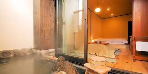 Enjoy a traditional Japanese outdoor bath in your room in Hakone