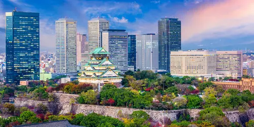 Osaka castle, surrounded by city business center skycrapers